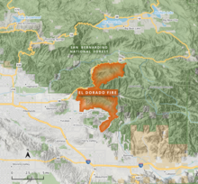 The footprint of the El Dorado Fire is shown in orange, extending from Highway 38 in the north to between Oak Glen and Cherry Valley in the south in an irregular shape against the San Bernardino National Forest in dark green.