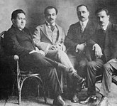 A 1920 photograph of four prominent members of The Pen League literal meanings being "the Arab diaspora" predecessors in the Nahda movement (or the "Arab Renaissance"). (From left to right): Nasib Arida, Kahlil Gibran, Abd al-Masih Haddad, and Mikhail Naimy. Algunos miembros de Al-Rabita al-Qalamiyya.jpg