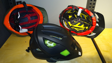 Types of modern bicycle helmet design technologies. Energy absorbing Bontrager Wavecell (left) and Smith Koroyd (center); MIPS (right) Bicycle Helmet Protection Technologies.png