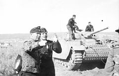 Adelbert Schulz, commander of 25 Panzer Regiment, the main striking force of the 7th Panzer Division, near a Panzer III in June 1943 Bundesarchiv Bild 101I-022-2922-13, Russland, Adelbert Schulz, Oberstleutnant der Panzertruppen.jpg