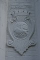 Crest of the Singapore Municipal Commission on a gatepost of the former Bidadari Cemetery