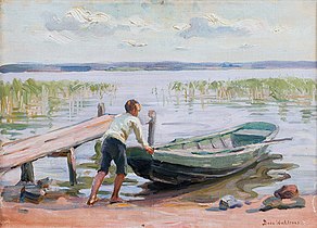 Poika ja vene rannalla