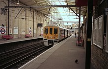 A Network SouthEast livery British Rail Class 319 in the station switching power supply in 1991 Farringdon station - geograph.org.uk - 733756.jpg