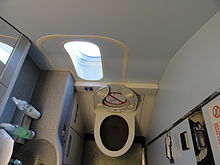 A business class lavatory with a window, on board an Air Canada Boeing 777-200LR (2011) First class Lavatory with Window.jpg