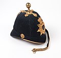 A brit Royal Irish Regiment 1878-as mintájú Home Service helmet sisakja.