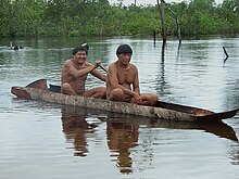 Kalapalo men canoeing.jpg