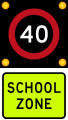 (R1-6) 40 km/h school zone speed limit in effect when flashing