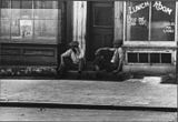 In July 1938, Dick was in Baltimore, taking photographs of poor black and white neighborhoods.