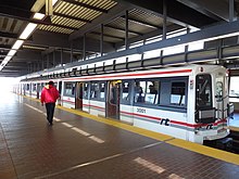 An S-series train leaving Kennedy station. The S series is used exclusively on Line 3 Scarborough. The train is photographed in its original livery that was used between 1985 and 2015. Trainkennedytoronto.JPG