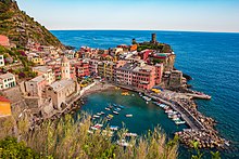 Cinque Terre on the Italian Riviera, one of the most popular tourist destinations in Italy Vernazza and the sea, Cinque Terre, Italy.jpg