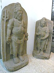 The left Indonesian statue shows Agastya with Shiva's trident, as a divine sage of Shaivism. Agastya iconography is common in southeast Asian temples. Agastya.jpg