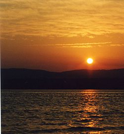 The sun sets over Deer Lake, Newfoundland, June 2003.