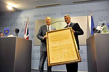 Former rebel leader Hashim Thaci and Blair with the Declaration of Independence of Kosovo in 2010 Hashim Thaci - Tony Blair with Declaration of Independence of Kosovo.jpg