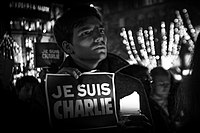 Парижалъул къотIноб "Дун Шарли" абураб плакатгун цояв
