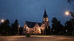 Kyrkan i nattlig belysning