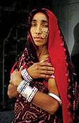 A woman from Bundi district in Rajasthan. The district registered a population of 1,113,725 in 2011, a growth rate over 2001-2011 of 15.7%, a sex ratio of 922 females for 1000 males, and a literacy rate of 62.31%.[8]
