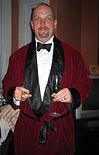 Smoking jacket, a men's jacket worn informally with black tie