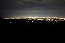 View of the Phoenix metro area from the top of Goldmine Trail in the San Tan Mountains San Tan Mountain Lights.jpg