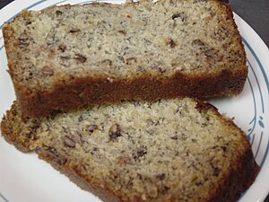 Two slices of banana bread on a plate. Recipez...
