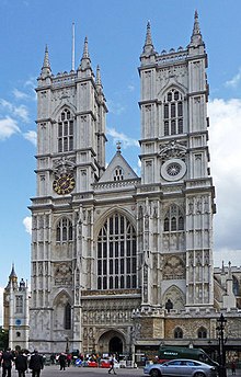 The consecration of Westminster Abbey stimulated population growth west of the City of London Westminster Abbey west front.jpg