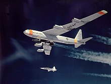 X-15 attached to its B-52 mother ship with a T-38 flying nearby X-15 and B-52 Mother ship.jpg