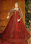 Cirka 1570: en blygsam pipkrage och snäva ärmar. Under kjolen en ännu trattformad vertugall.