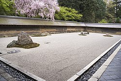 Rocks in Ryōan-ji (late 15th century) in Kyoto, Japan, a famous example of a zen garden