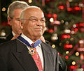 Norman Francis receiveing Presidential Medal of Freedom in 2006 from President George W. Bush