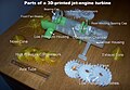 Labeled parts of Howard Community College's 3D printed jet-engine turbine. Part layout shows general configuration of parts in finished assembly.