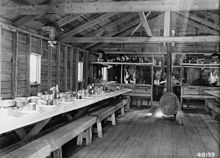 Mess hall at a logging camp Photograph of Mess Hall at a Logging Camp - NARA - 2129369.jpg