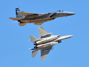 Two F-15's breaking formation.