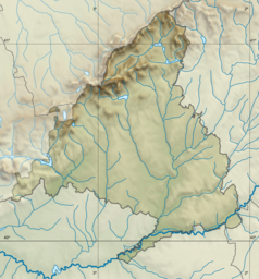 Mapa konturowa wspólnoty autonomicznej Madrytu, w centrum znajduje się punkt z opisem „Madryt”