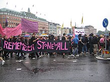 Queer anarchist bloc with banner reading "remember Stonewall" Stockholm Pride Parade - Anarchist block - 2726504058.jpg