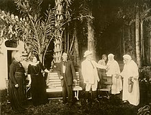 Photo from Act II showing the garden of Count Anteoni as he welcomes the Sand Diviner