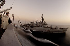 Libeccio replenish alongside USS Camden at Persian Gulf on 6 June 2005.