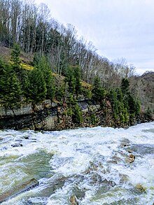 Portrait photo showing Yellow Creek Spillway, with lake waters flowing into Yellow Creek