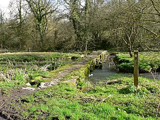 Clapper Bridge over the Afon Alun on the Valeways Heritage Trail Bridge and footpath over the Afon Alun - geograph.org.uk - 1203603.jpg