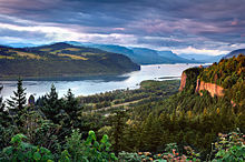 The Columbia Gorge marks where the Columbia River splits the Cascade Range between the states of Washington and Oregon. Columbia River Gorge (3).jpg