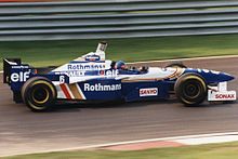 Photo de profil d'une monoplace de Formule 1 soutenue par le cigarettier Rothmans