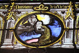 Médaillon de vitrail médiéval représentant la Création un personnage remettant deux tables avec des inscriptions à un personnage à genoux