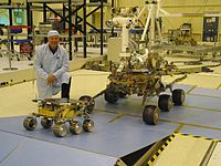 Mars Exploration Rover (rear) and Sojourner rover MER vs. Sojourner PIA04827.jpg