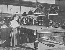 Two women playing English billiards