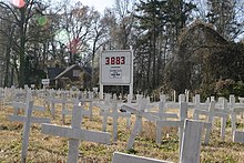 A memorial in North Carolina in December 2007; US casualty count can be seen in the background. Us troop iraq casualty memorial.jpg