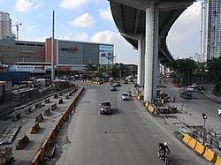 A. Bonifacio Avenue south of Balintawak Interchange with Ayala Malls Cloverleaf on the background