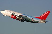 Visit Wales being advertised on a Bmibaby Boeing 737-500 logojet. Bmibaby Boeing 737-500 duty free logojet Spijkers.jpg