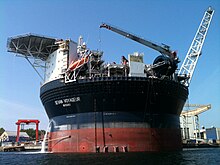 The circular FPSO Sevan Voyageur moored at Nymo yard at Eydehavn, Norway FPSO Sevan Voyageur.jpg