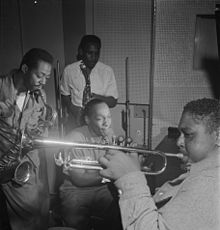 Zleva: Fats Navarro, Charlie Rouse, Ernie Henry a Tadd Dameron. fotoWilliam P. Gottlieb.