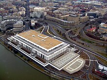The Kennedy Center as seen from the air on January 8, 2006 (before construction of the REACH expansion). A portion of the Watergate complex can be seen at the left KennedyCenterFromAir2.JPG