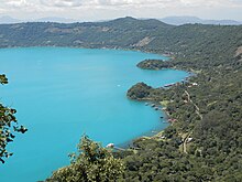 Cyanobacteria activity turns Coatepeque Caldera lake into a turquoise color. Lago de coatepeque de color.jpg