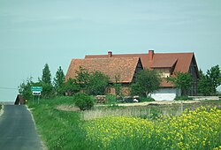 Houses by the roadside in Nowa Wieś Goszczańska